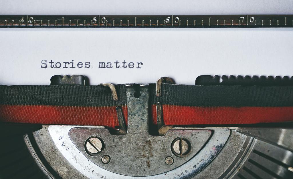 'Stories matter' written on a typewriter.